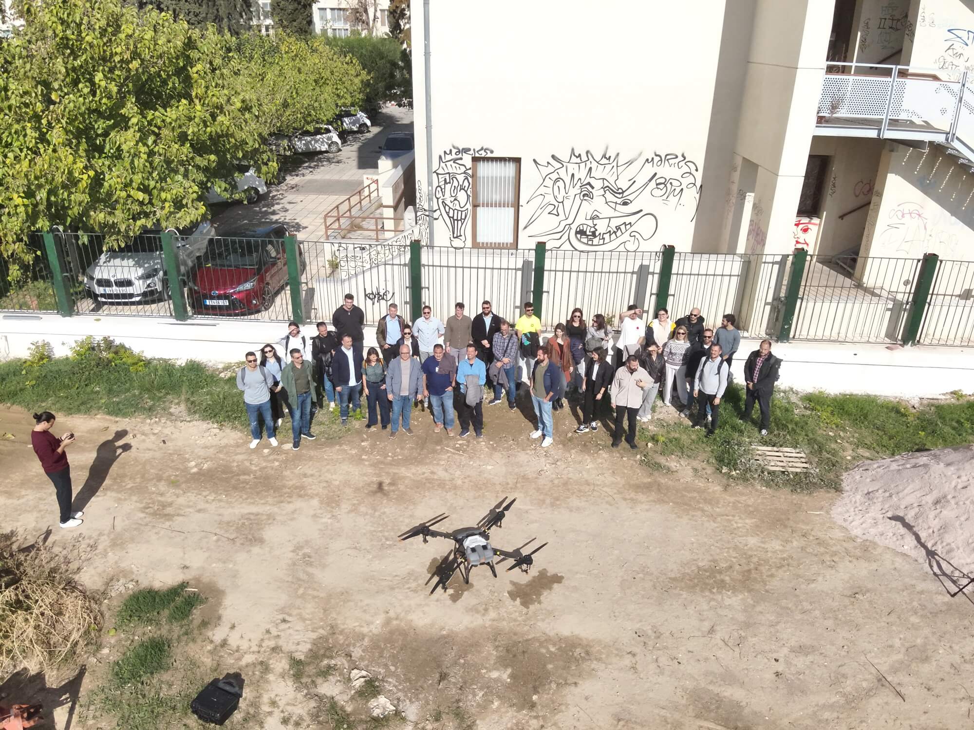Aerial group photo of all event attendees, second angle