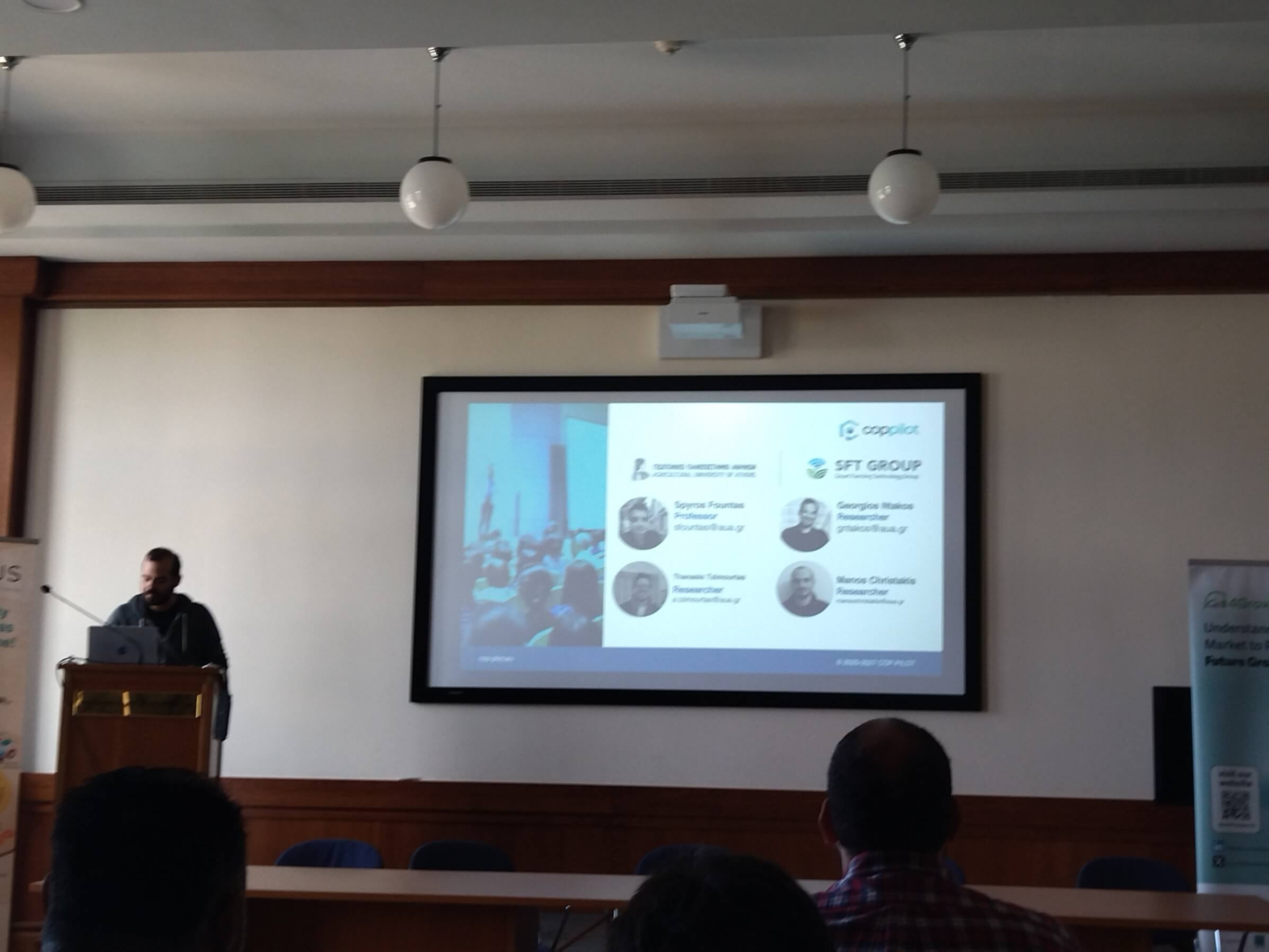 Presenter showing the project partners and contributors slide